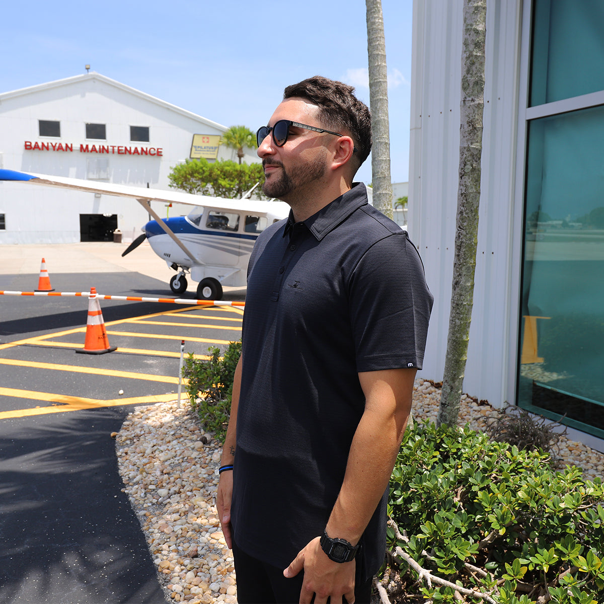 TravisMathew Performance Black Polo