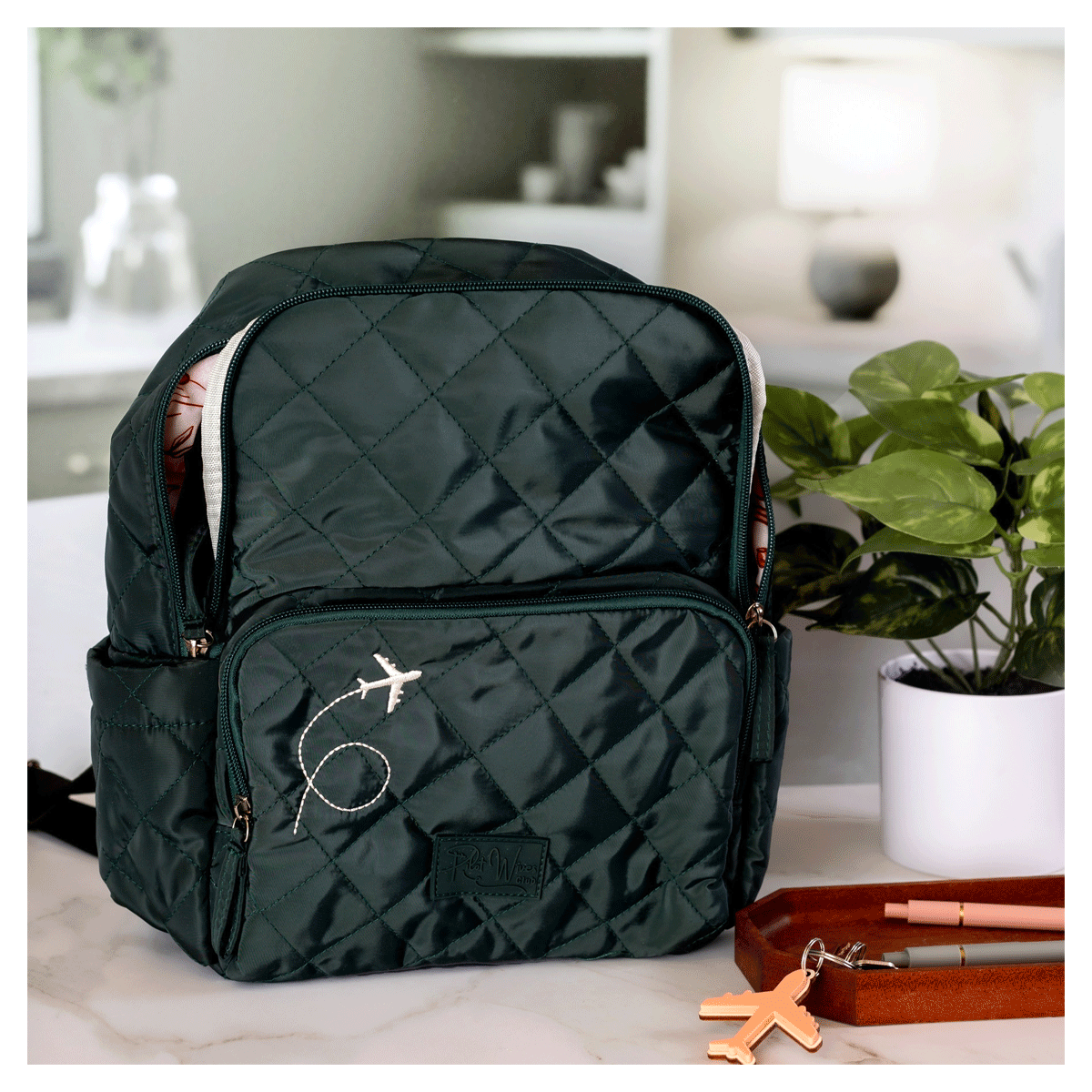 Dark Green Mini Backpack � Quilted Travel Bag with Airplane Detail image 0
