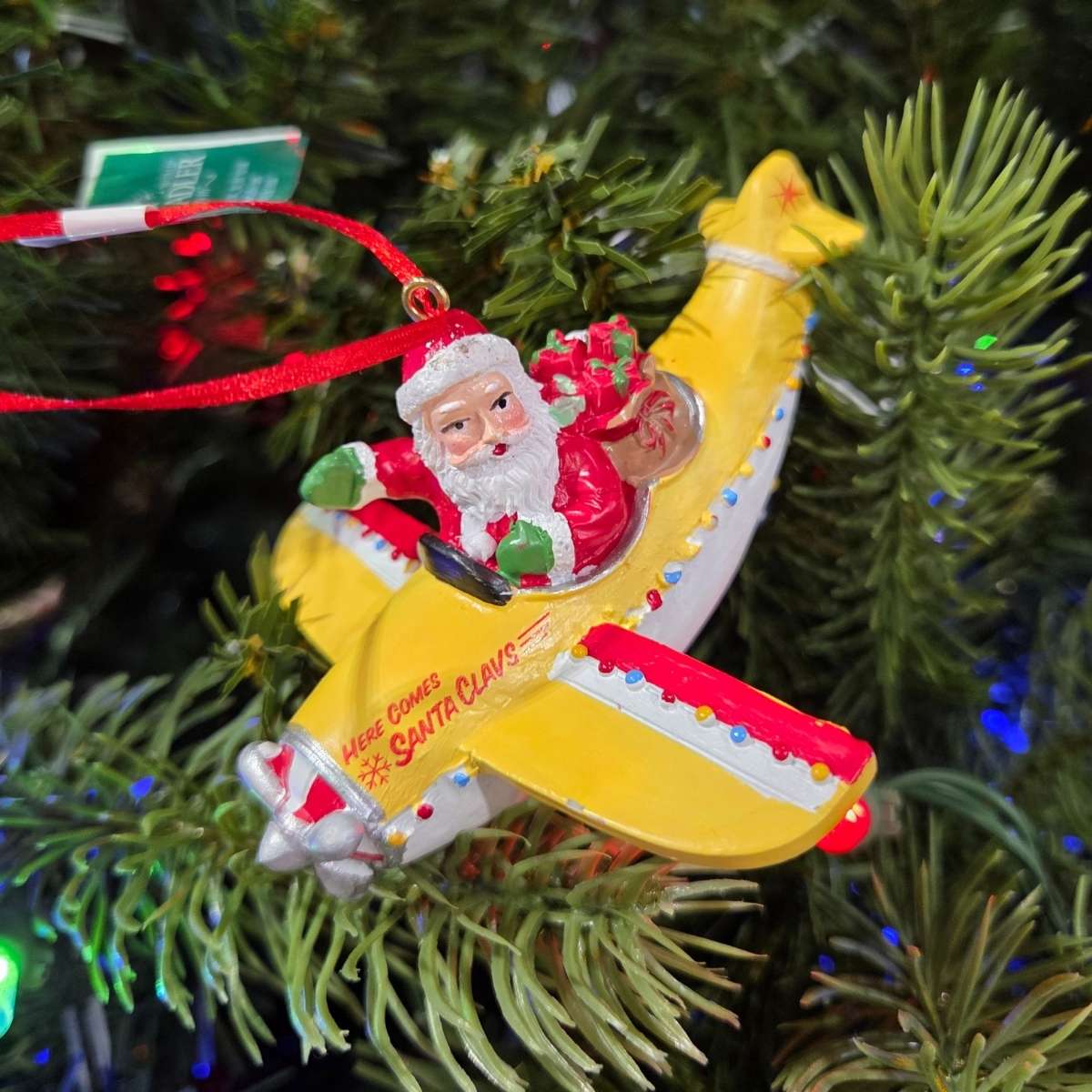 Santa on an airplane ornament image 0